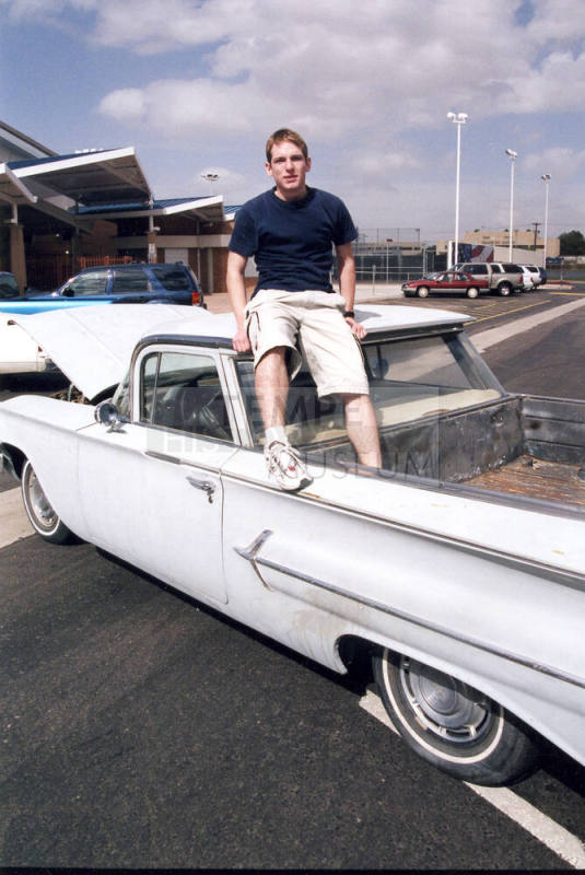 Tempe High School - Boy Sitting on Car Roof