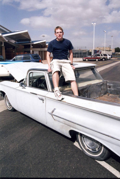 Tempe High School - Boy Sitting on Car Roof