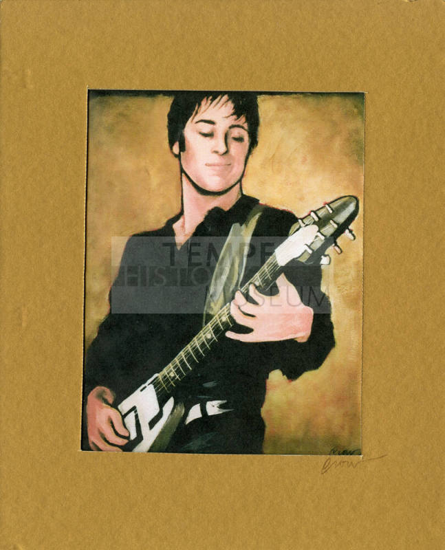 Mike Corte with a Guitar