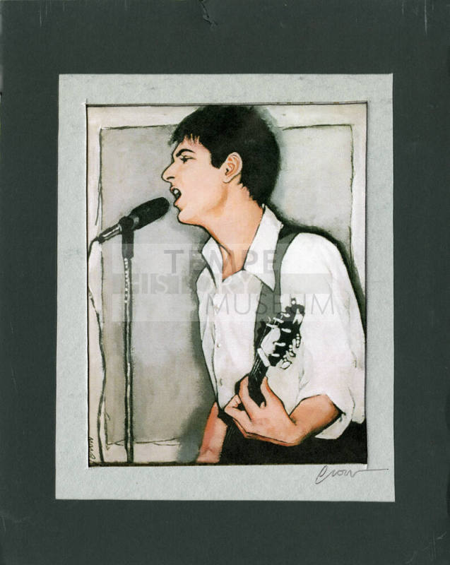 Mike Corte Singing and Playing a Guitar