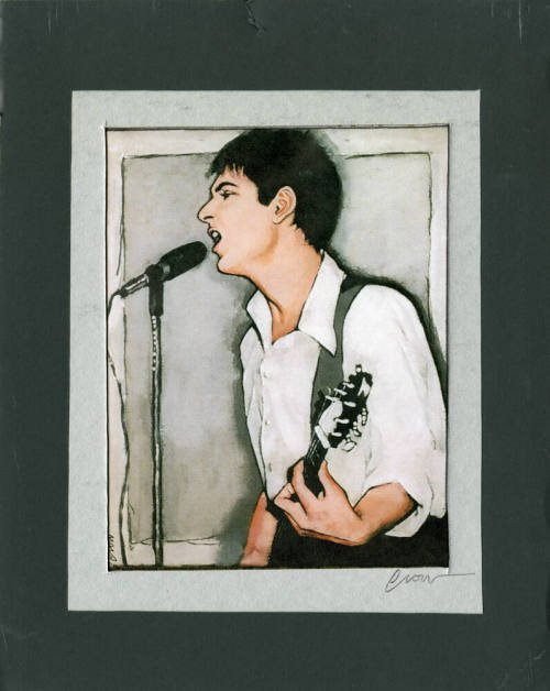 Mike Corte Singing and Playing a Guitar