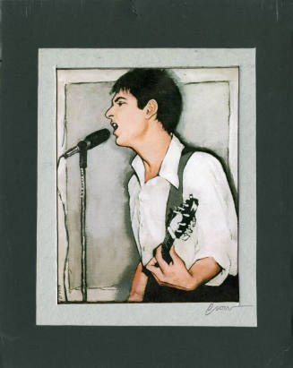 Mike Corte Singing and Playing a Guitar