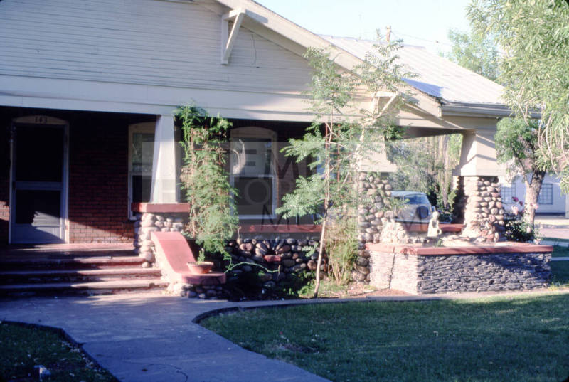 House on southeast corner of 9th St. and Ash Ave.
