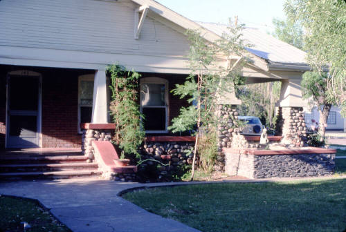 House on southeast corner of 9th St. and Ash Ave.