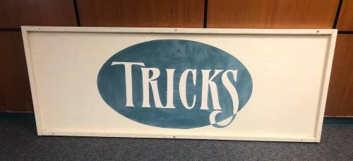House of Tricks Sign