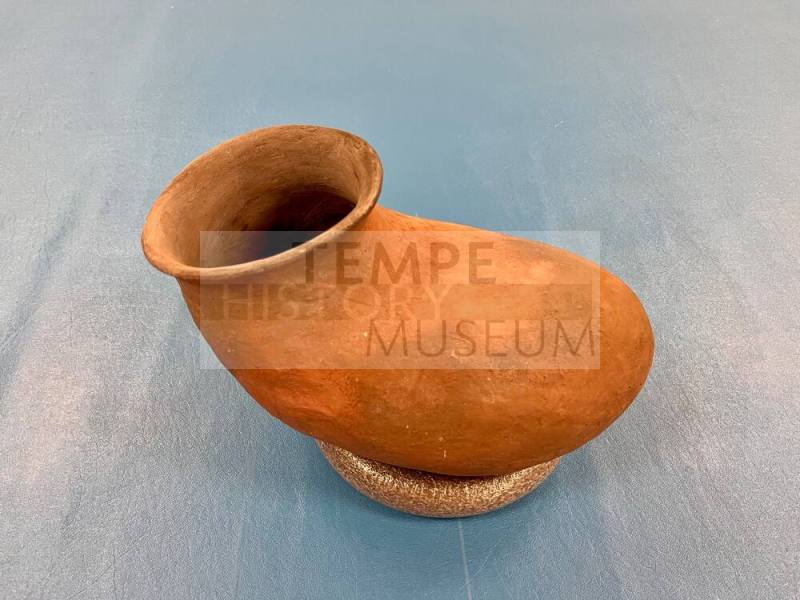 Ceramic Salado Red pottery, long boot shape