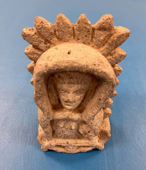 Stone figurine, possibly Virgin of Guadalupe