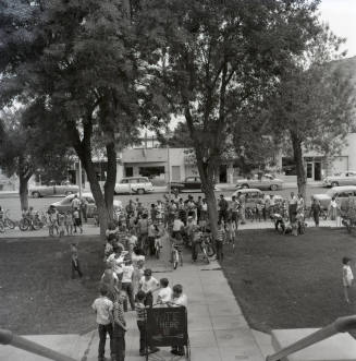 Adults and Children Standing Near a Vote Here Sign, Tempe City Hall