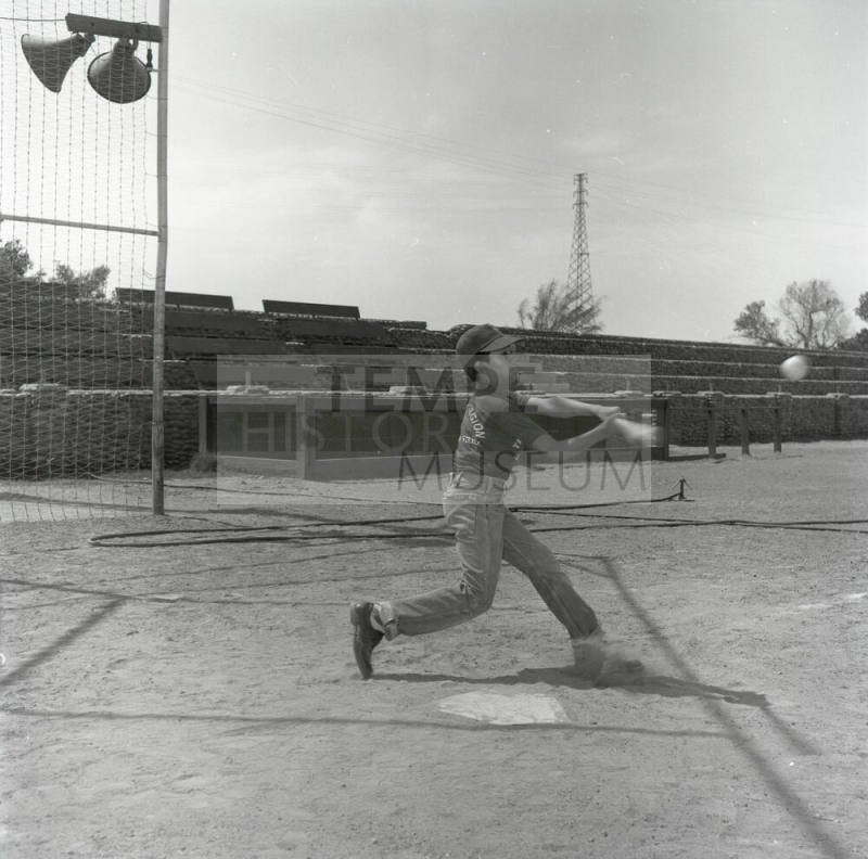 Young Boy Swinging at a Baseball at Tempe Beach Park