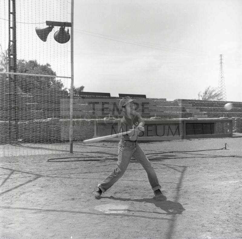 Young Boy Swinging at a Baseball at Tempe Beach Park