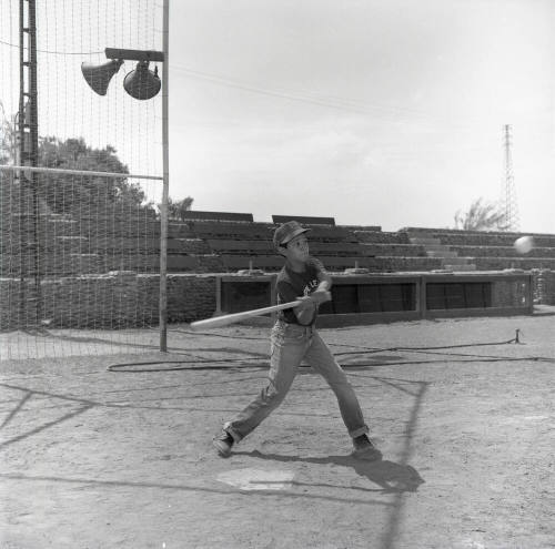 Young Boy Swinging at a Baseball at Tempe Beach Park