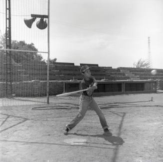 Young Boy Swinging at a Baseball at Tempe Beach Park