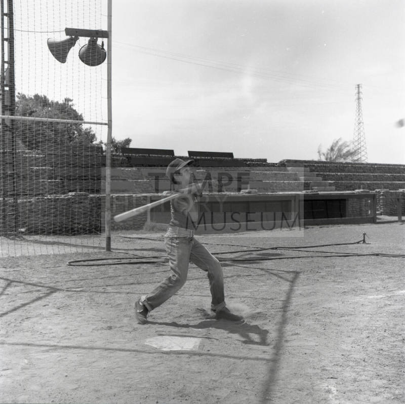 Young Boy Swinging at a Baseball at Tempe Beach Park