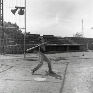 Young Boy Swinging at a Baseball at Tempe Beach Park