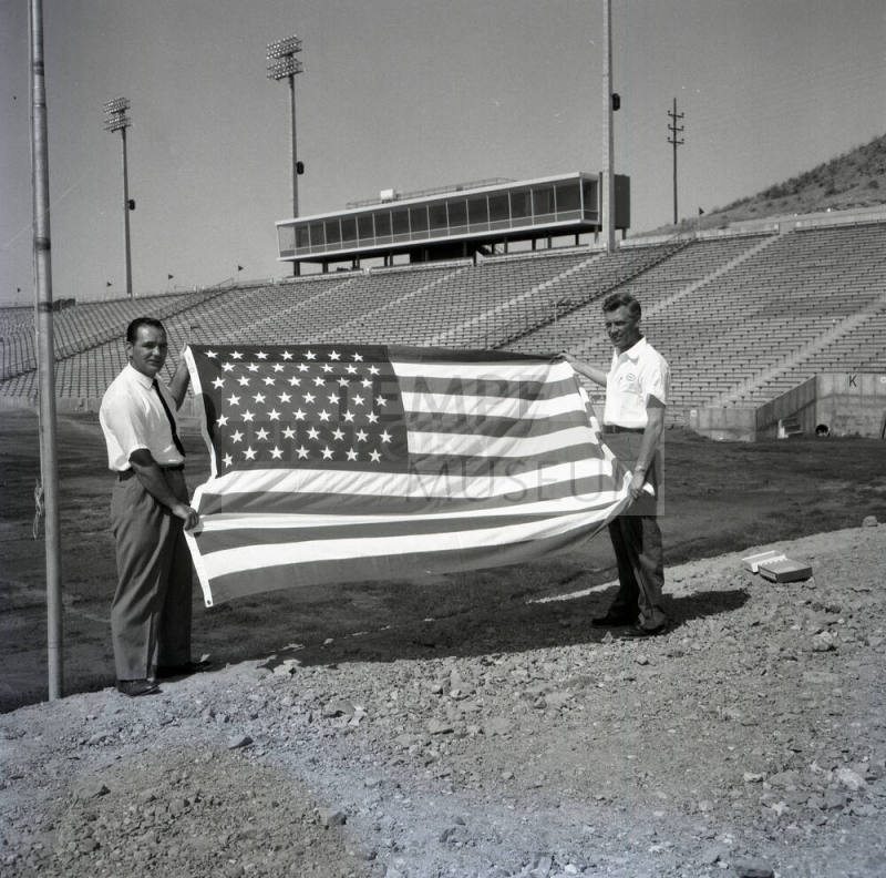Two Men with American Flag at Sun Devil Stadium