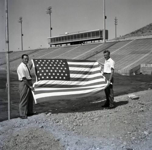 Two Men with American Flag at Sun Devil Stadium