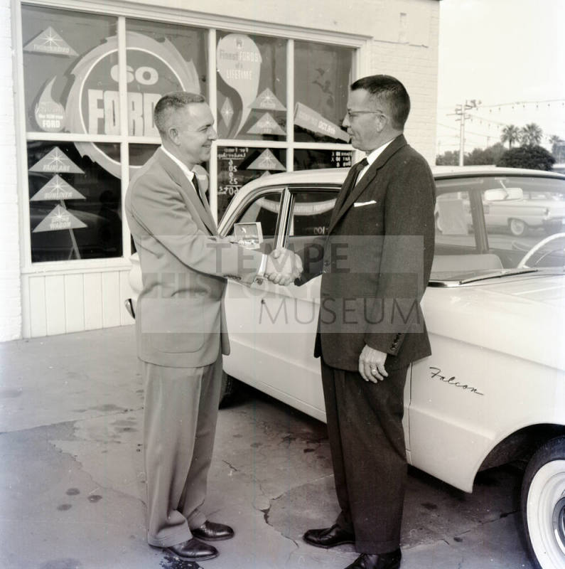 Richard Litz and Stanley Berge Shaking Hands