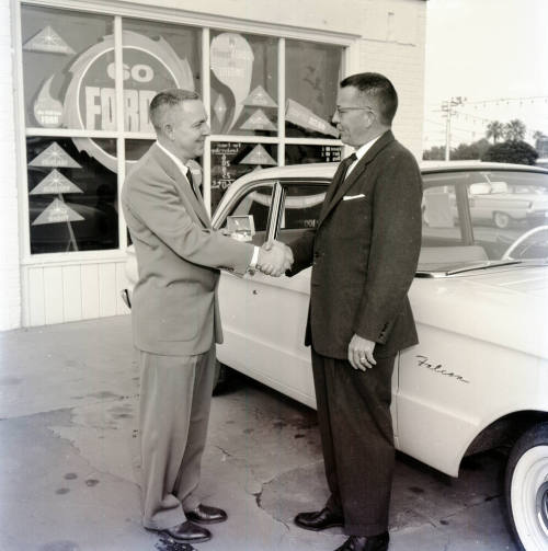 Richard Litz and Stanley Berge Shaking Hands