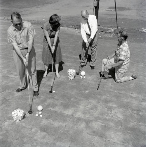 Golfers at Papa-Go Golf Course