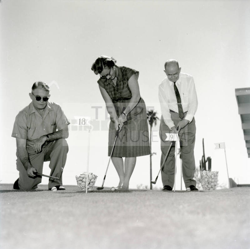 Golfers at Papa-Go Golf Course