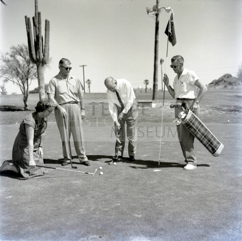 Golfers at Papa-Go Golf Course