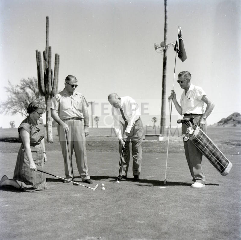 Golfers at Papa-Go Golf Course