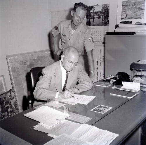 Mayor Laird Signing a Proclamation