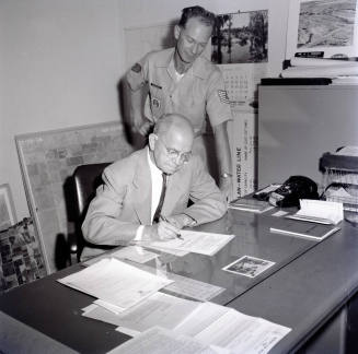 Mayor Laird Signing a Proclamation