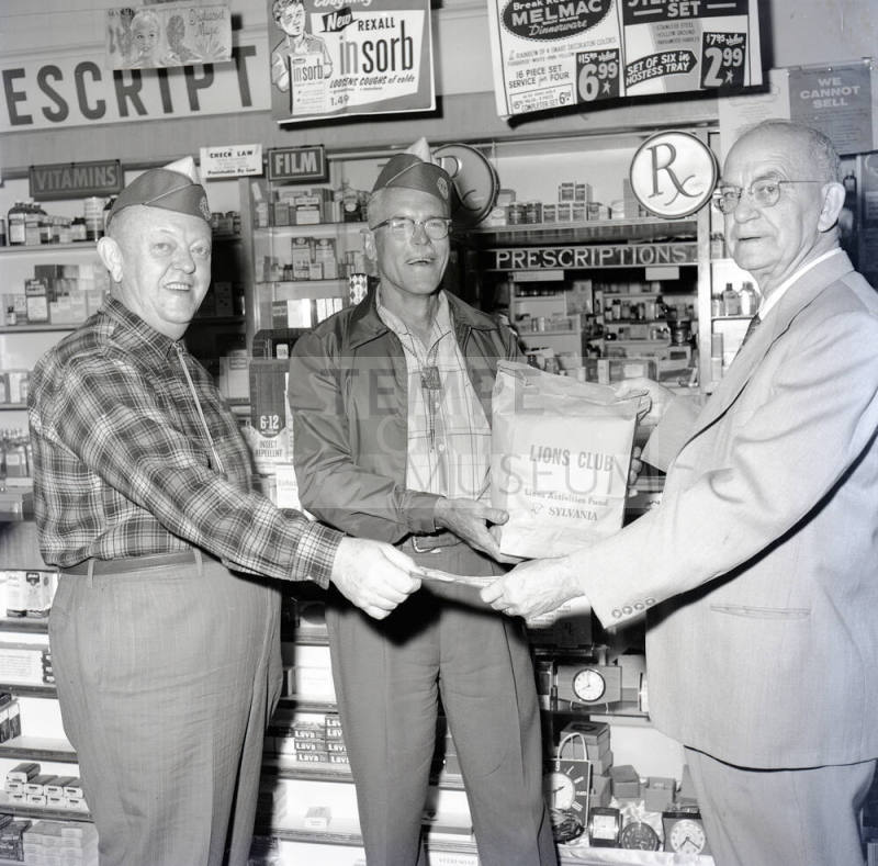 Mayor Laird Receiving Light Bulbs