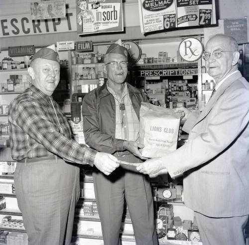 Mayor Laird Receiving Light Bulbs