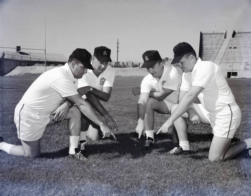 4 ASU Coaches on Field at Sun Devil Stadium