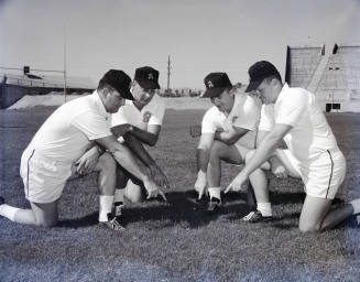 4 ASU Coaches on Field at Sun Devil Stadium