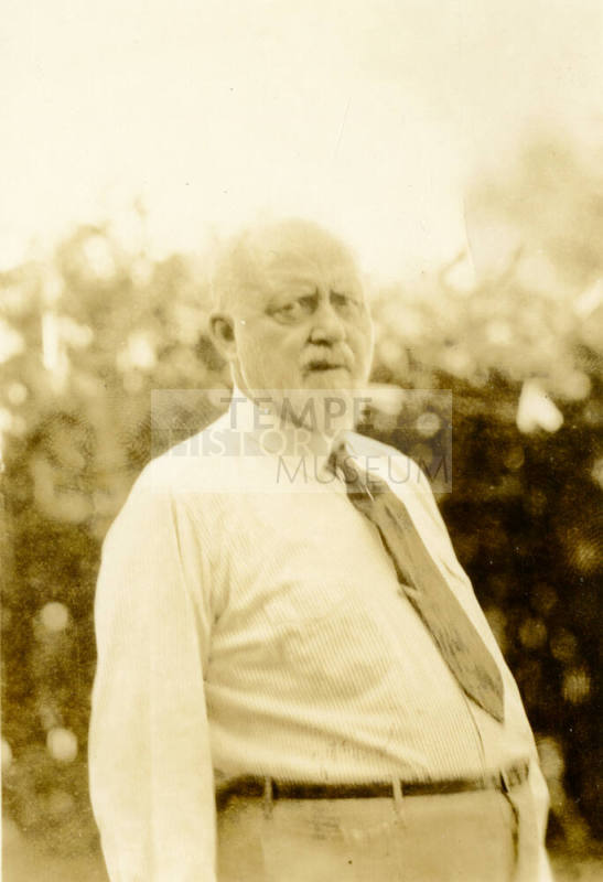 Snapshot of Dr. Fenn J Hart standing outside his home in Phoenix, Arizona