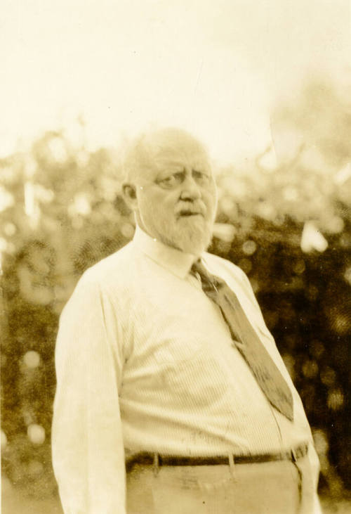 Snapshot of Dr. Fenn J Hart standing outside his home in Phoenix, Arizona