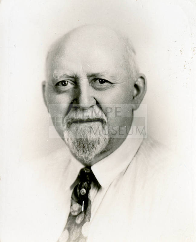 Professional headshot of Dr. Fenn J Hart in his later years