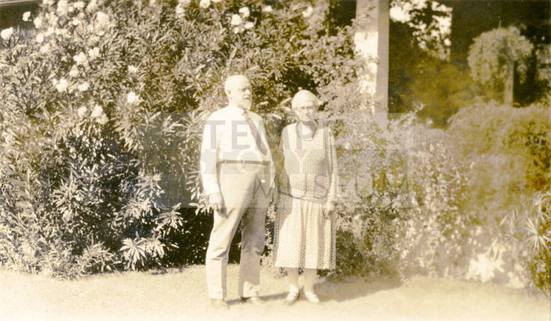 Close-up of Dr. Fenn J Hart and his wife Rosa Brown Hart outside their home in Phoenix