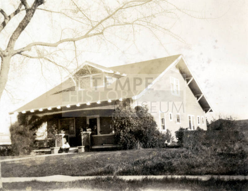 Exterior front and right side view of Dr. Fenn J Hart's home in Phoenix