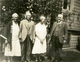 Group photo of Rosa Brown Hart, Thomas Knight, an unkown female and Dr. Fenn J Hart outside Mr. Knight's home in San Francisco