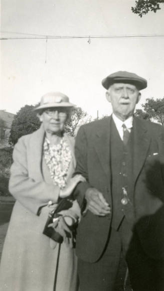 Snapshot of Dr. Fenn J Hart, standing outside next to his wife at an unknown location