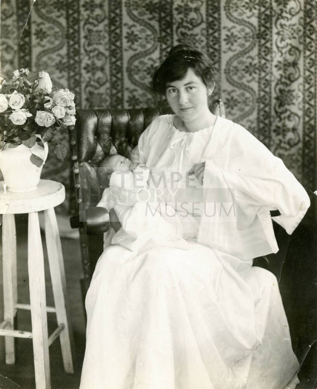 Portait of Mildred Hart Wilson holding a newborn Robert Hart Wilson