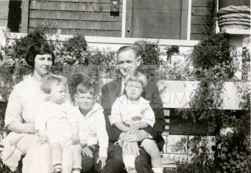 Family photo of Mildred Muriel Hart Wilson, daughter of Dr. Fenn J Hart, with her husband and children
