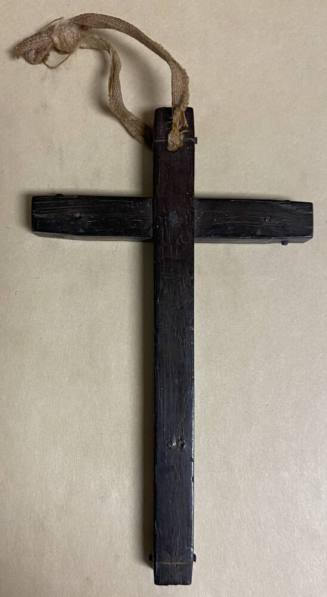 Wooden cross carried by Dr. Fenn J Hart during his time serving as a Red Cross physician and combat surgeon in Manila during the Spanish-American and Philippine Wars from 1898 - 1900