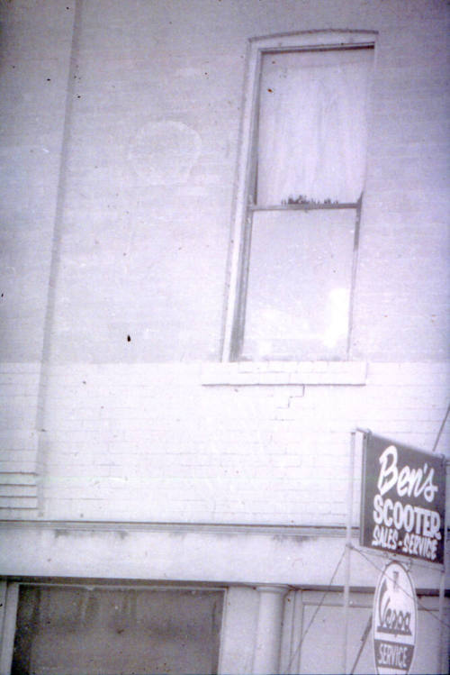 Slide-Exterior of Ben's Scooter Sales-Service Sign & Building