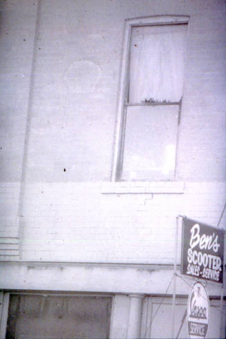 Slide-Exterior of Ben's Scooter Sales-Service Sign & Building