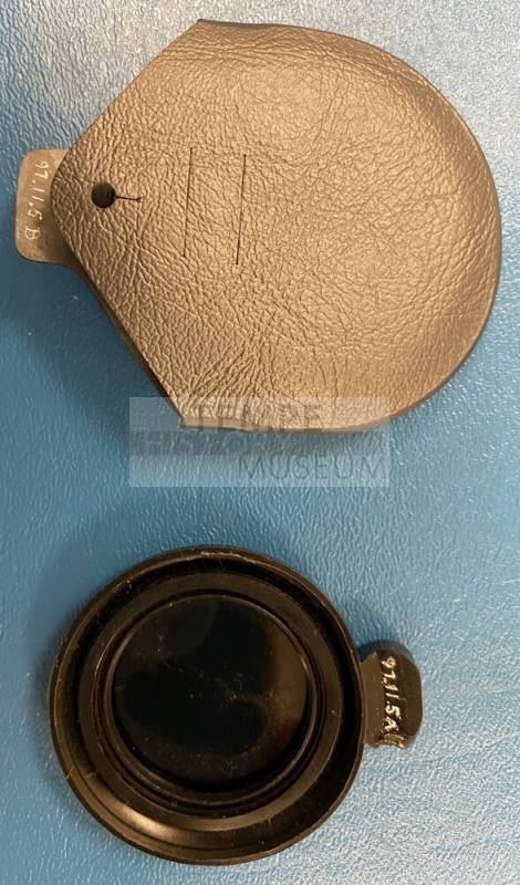 Light reducing lens