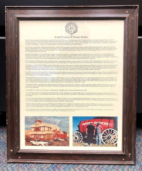 Framed poster, history of Minder Binders