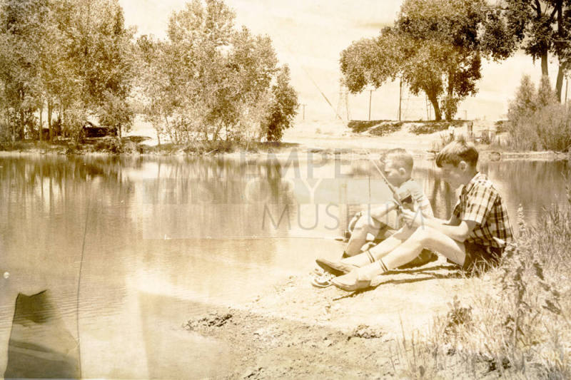 Two Boys Fishing in a Park