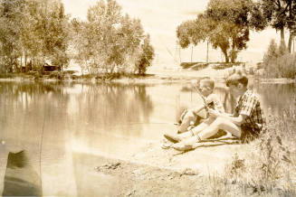 Two Boys Fishing in a Park