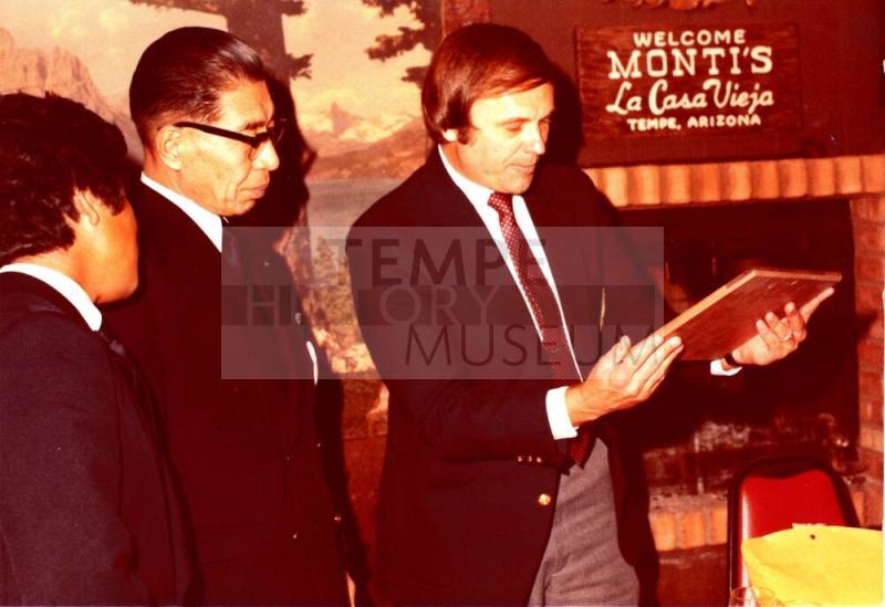 Shojiro Ozu and Harry Mitchell look at Monti's Plaque