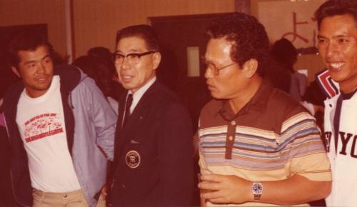 Shojiro Ozu standing alongisde Team Members at Monti's
